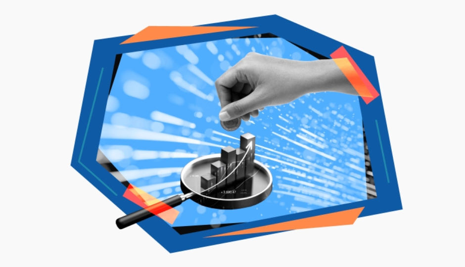 hand dropping coin into a bar chart on top of a magnifying glass