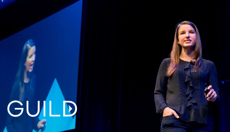 Image of woman speaking on stage