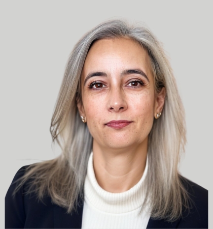 headshot of Natasha Chand on grey background